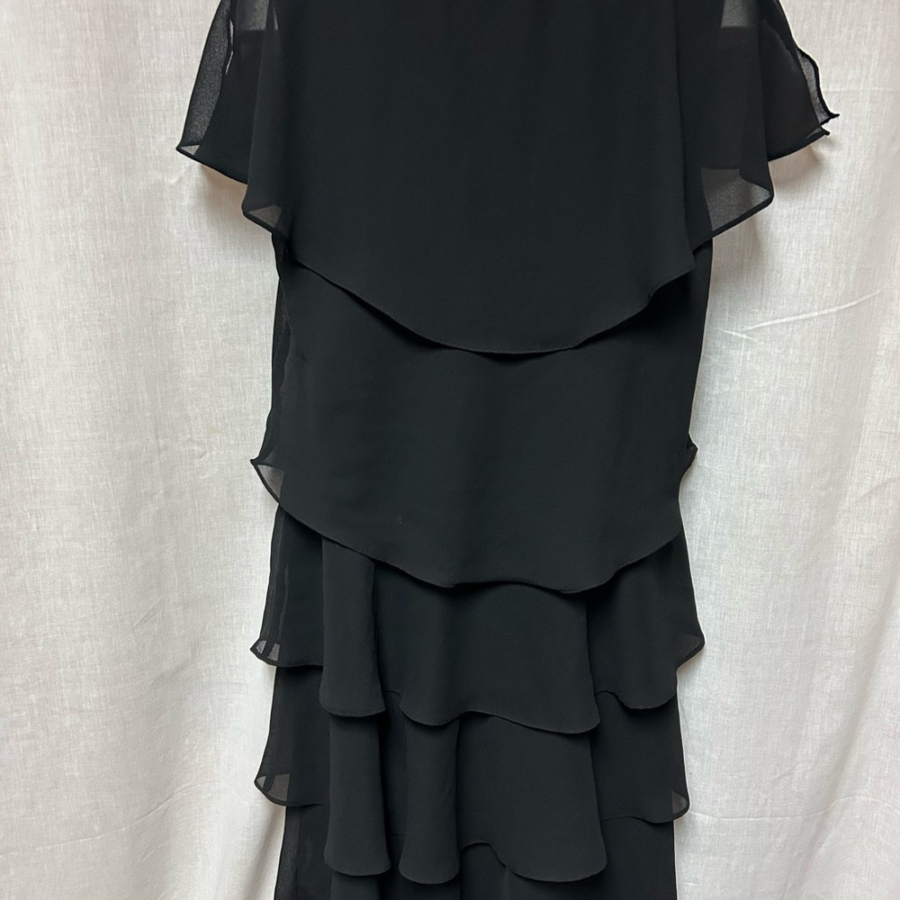 Black tiered sassy dress 
Cruise 
Hem 40” 23” armpit to armpit flat 
Size 18 - Picture 6 of 13